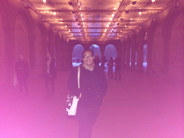 A woman posing in a tunnel at Central Park