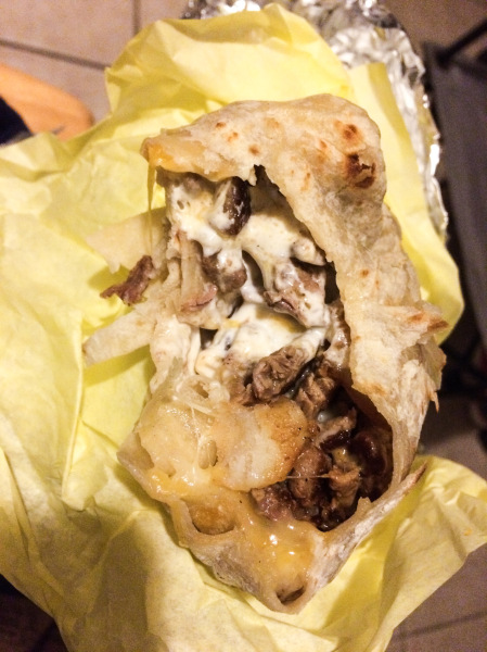 California burrito filled with beef, sour cream, extra cheese, & fries