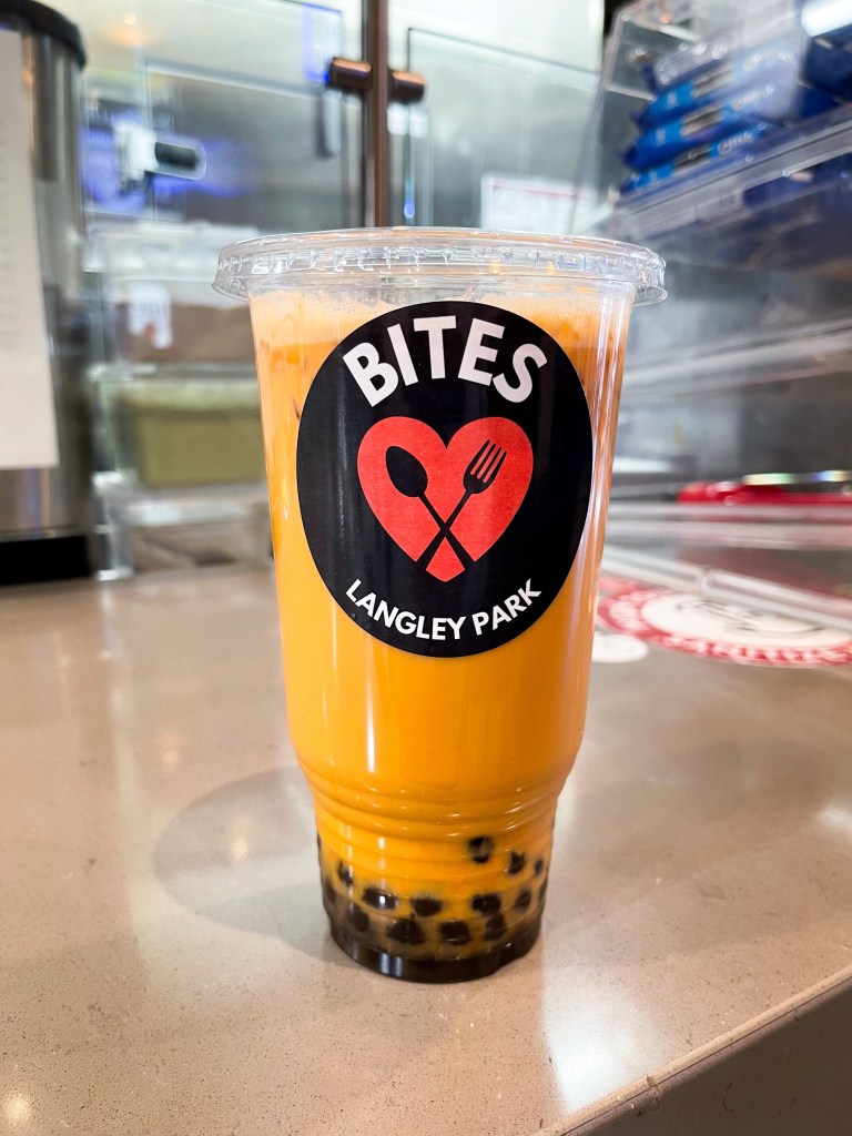 A large cup of bubble tea sitting on the counter at SmoothieFRESH & Bubble Tea, a bubble tea shop in Hyattsville, Maryland