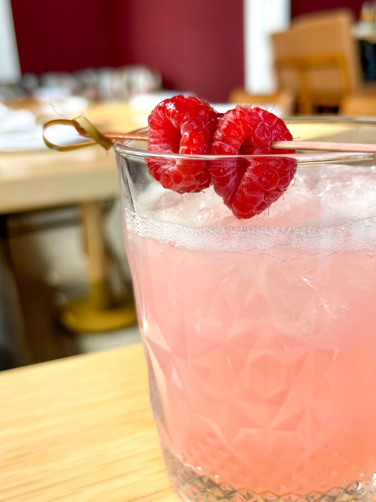A close up photo of a cocktail sitting on a table. The cocktail is called "Life on the Water." It's from Ada's on the River, which is a restaurant located in Old Town Alexandria, Virginia.