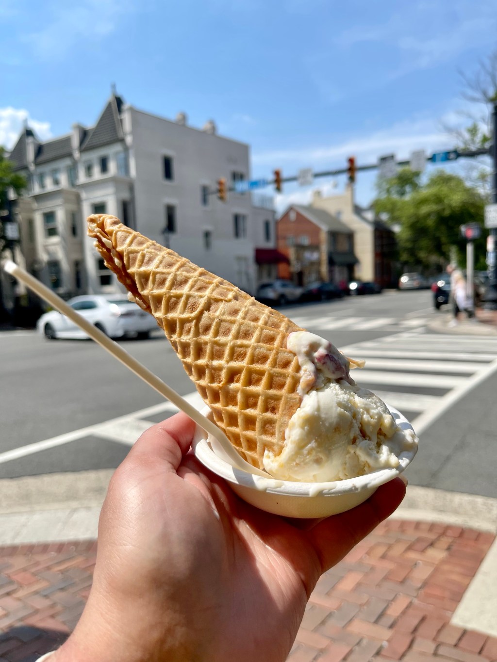 A hand holding ice cream from Jeni's Splendid Ice Creams, an ice cream company based in the United States