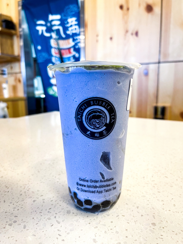 A taro smoothie with boba pearls from Tai Chi Bubble Tea sitting on a countertop