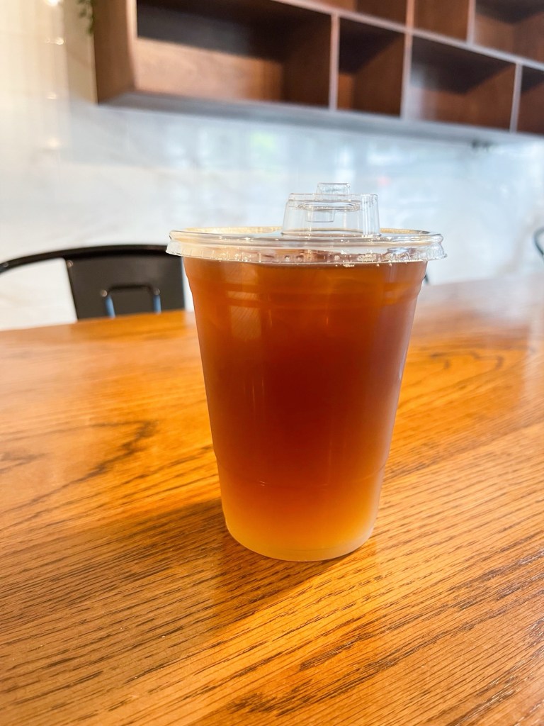 A coffee drink sitting on a table